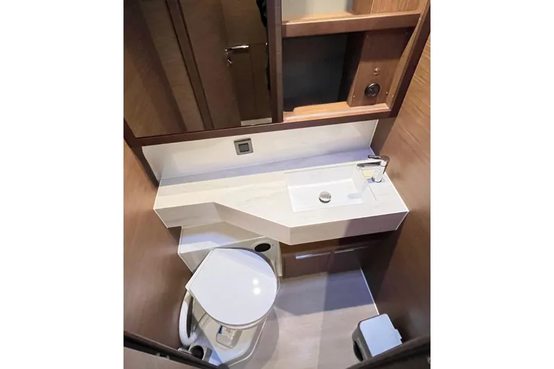 Alegr&iacute;a Yacht Photos Pics Modern bathroom in 2020 Lagoon 46 yacht with sleek sink and compact toilet.