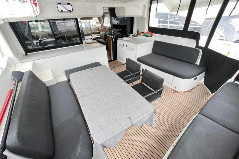 Alegr&iacute;a Yacht Photos Pics Spacious interior of 2020 Lagoon 46 catamaran with modern seating and dining area.