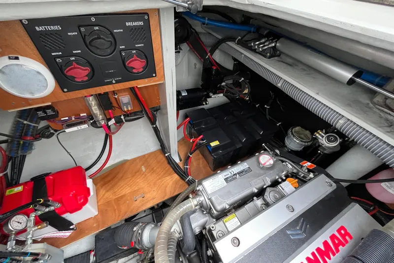 Alegr&iacute;a Yacht Photos Pics Engine compartment of 2020 Lagoon 46 catamaran, featuring Yanmar engine and battery controls.