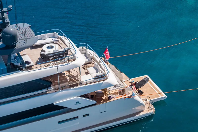 Sk Yacht Photos Pics Luxurious 2019 Custom Line Navetta 33 yacht with spacious deck and elegant design on blue water.