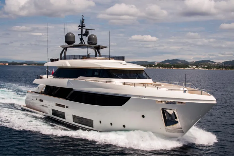 Sk Yacht Photos Pics Luxurious 2019 Custom Line Navetta 33 yacht cruising on open water.