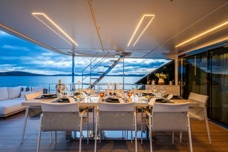 Sk Yacht Photos Pics Luxurious dining area on 2019 Custom Line Navetta 33 yacht with ocean view.