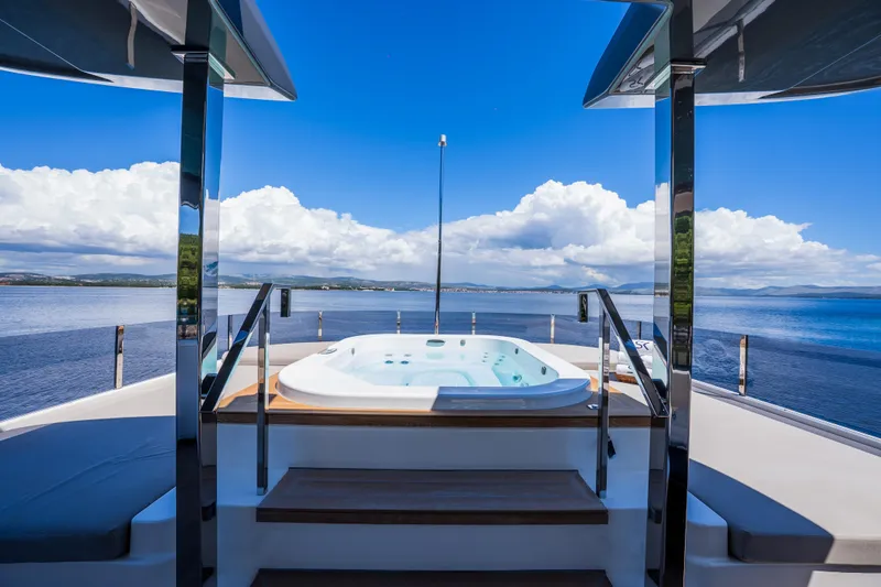 Sk Yacht Photos Pics Luxurious 2019 Custom Line Navetta 33 yacht with jacuzzi and stunning ocean view.