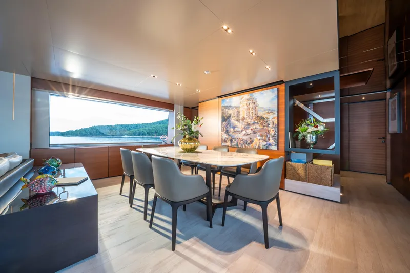 Sk Yacht Photos Pics Luxurious dining area on 2019 Custom Line Navetta 33 yacht with scenic window view.