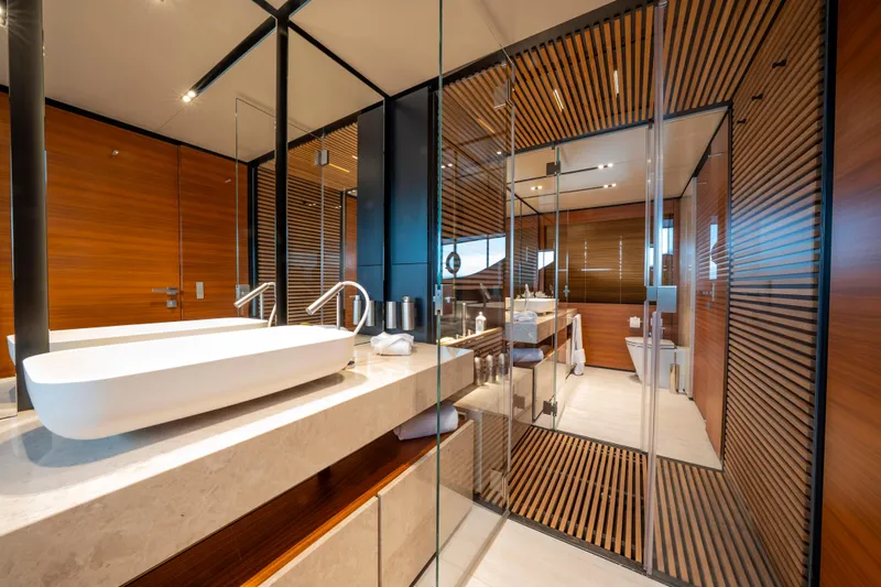 Sk Yacht Photos Pics Luxurious bathroom interior on 2019 Custom Line Navetta 33 yacht, featuring modern design and elegant fixtures.