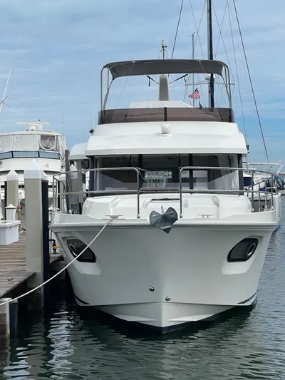  Yacht Photos Pics 2021 Beneteau Swift Trawler 41 Fly docked at marina.