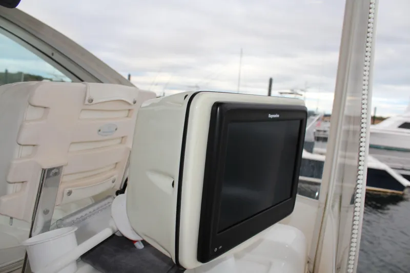 Holly Ann Yacht Photos Pics 2005 Rampage 38 Express boat with Raymarine navigation display.