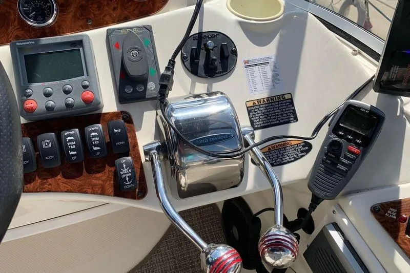  Yacht Photos Pics Control panel of a 2007 Meridian 341 Sedan boat with navigation and communication equipment.