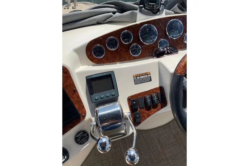 Yacht Photos Pics Dashboard of a 2007 Meridian 341 Sedan boat with gauges and controls.