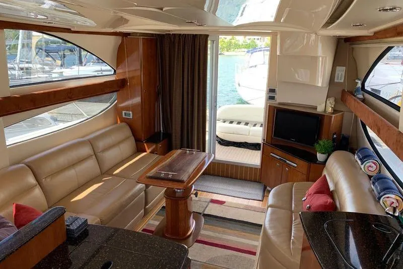  Yacht Photos Pics Luxurious interior of a 2007 Meridian 341 Sedan yacht with leather seating and elegant decor.