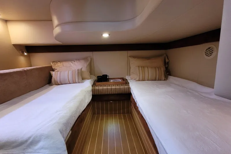  Yacht Photos Pics Luxurious 2007 Meridian 341 Sedan cabin with twin beds and elegant decor.