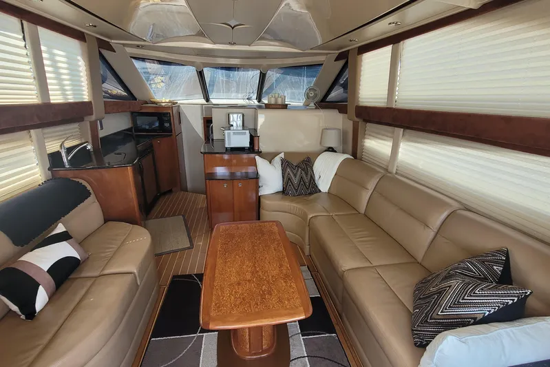  Yacht Photos Pics Luxurious interior of a 2007 Meridian 341 Sedan yacht with plush seating and modern amenities.