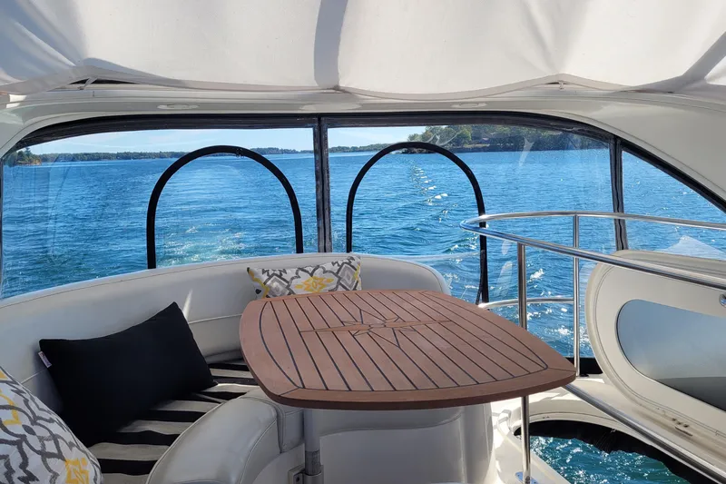  Yacht Photos Pics Interior view of 2007 Meridian 341 Sedan yacht with scenic ocean backdrop.