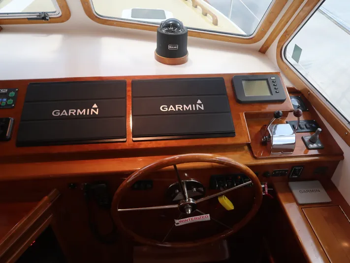 North Star Yacht Photos Pics 2009 Wesmac 44' helm with Garmin navigation system.