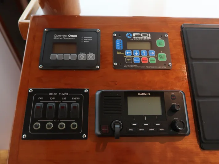 North Star Yacht Photos Pics Control panel of a Wesmac 44' boat with Garmin and Cummins Onan devices.