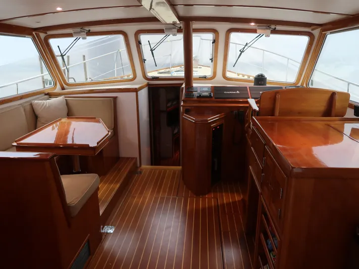 North Star Yacht Photos Pics Interior of a 2009 Wesmac 44' yacht with wooden furnishings.