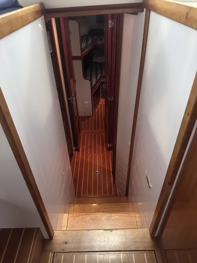 North Star Yacht Photos Pics Interior of a 2009 Wesmac 44' boat with wooden flooring.