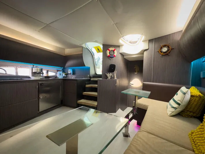  Yacht Photos Pics Luxurious interior of a 2005 Azimut Atlantis 55 yacht with modern furnishings.