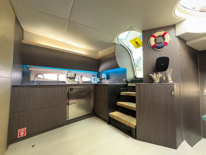  Yacht Photos Pics Luxurious kitchen interior of 2005 Azimut Atlantis 55 yacht with modern design elements.