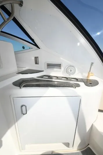 Time 'n Material Yacht Photos Pics 2007 Cruisers Yachts 420 Express interior with sleek white cabinetry and modern design.