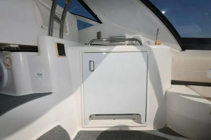 Time 'n Material Yacht Photos Pics 2007 Cruisers Yachts 420 Express interior with sleek white cabinetry and modern design.