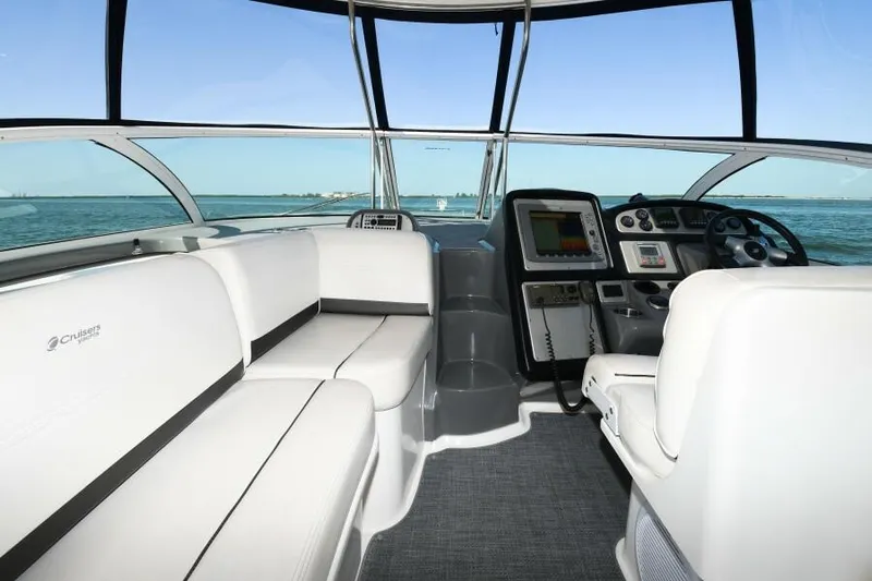 Time 'n Material Yacht Photos Pics 2007 Cruisers Yachts 420 Express interior with helm, seating, and ocean view.