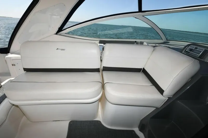 Time 'n Material Yacht Photos Pics 2007 Cruisers Yachts 420 Express interior seating with ocean view.