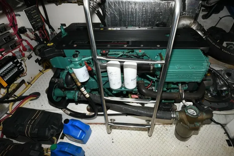 Time 'n Material Yacht Photos Pics Engine room of 2007 Cruisers Yachts 420 Express with visible components and equipment.