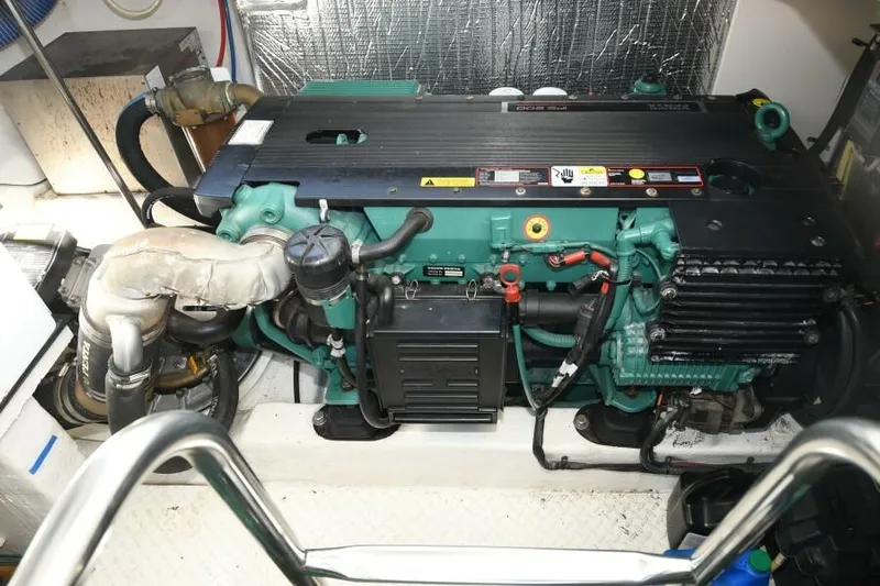 Time 'n Material Yacht Photos Pics Engine room of 2007 Cruisers Yachts 420 Express, showcasing marine engine components.