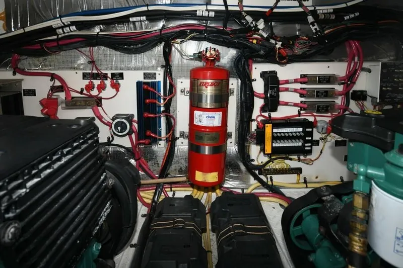 Time 'n Material Yacht Photos Pics Engine room of 2007 Cruisers Yachts 420 Express with wiring and fire extinguisher.