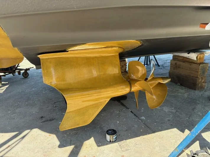 Time 'n Material Yacht Photos Pics Propeller and rudder of 2007 Cruisers Yachts 420 Express on dry dock.