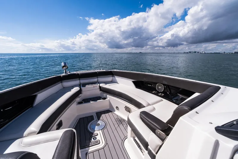 Dock's Knott Inn II Yacht Photos Pics 2018 Sea Ray SLX 350 Outboard boat interior with ocean view and clear skies.