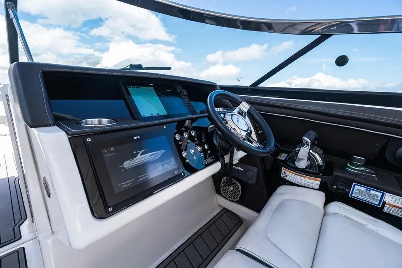 Dock's Knott Inn II Yacht Photos Pics 2018 Sea Ray SLX 350 Outboard helm with modern controls and navigation screens.