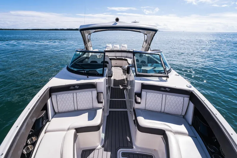 Dock's Knott Inn II Yacht Photos Pics 2018 Sea Ray SLX 350 Outboard boat on open water, featuring luxurious seating and sleek design.