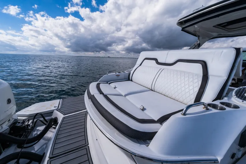 Dock's Knott Inn II Yacht Photos Pics 2018 Sea Ray SLX 350 Outboard boat with luxurious seating on open water.