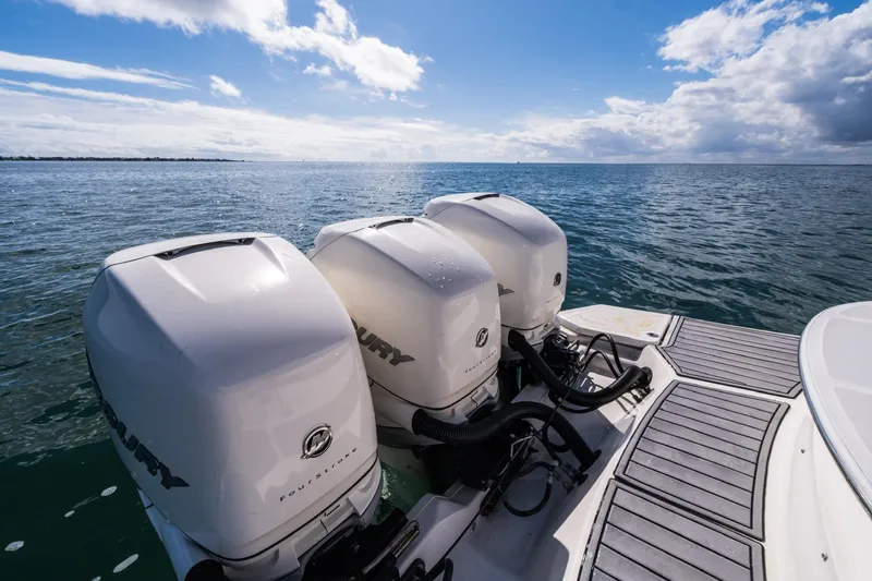 Dock's Knott Inn II Yacht Photos Pics 2018 Sea Ray SLX 350 Outboard with triple Mercury engines on open water.