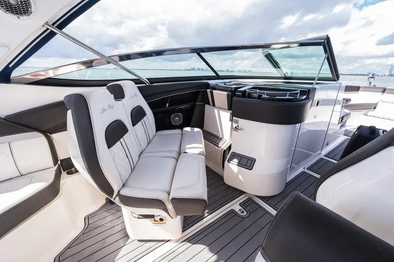 Dock's Knott Inn II Yacht Photos Pics Luxurious interior of 2018 Sea Ray SLX 350 Outboard boat with plush seating and sleek design.
