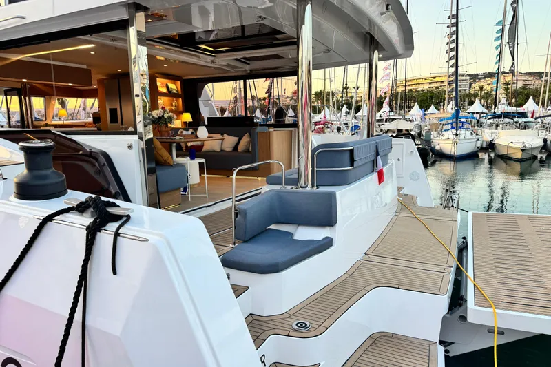  Yacht Photos Pics Luxurious 2026 Bali 5.2 yacht interior and deck at marina, showcasing modern design.