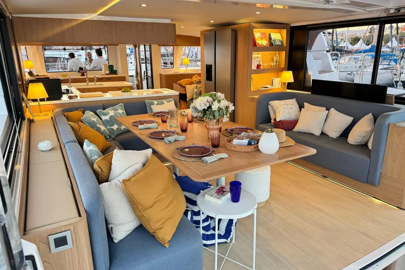  Yacht Photos Pics Luxurious interior of 2026 Bali 5.2 yacht with elegant dining and seating area.