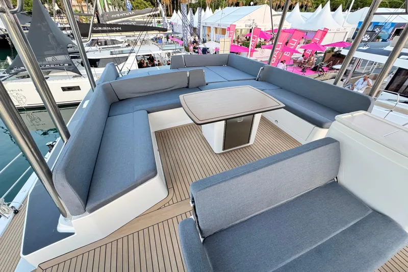  Yacht Photos Pics Luxurious 2026 Bali 5.2 yacht deck with spacious seating and elegant table setup.