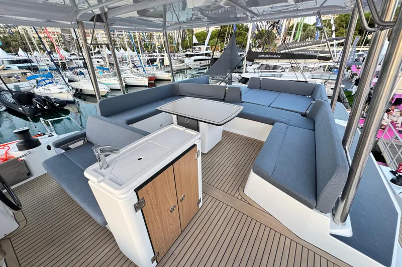  Yacht Photos Pics Luxurious 2026 Bali 5.2 yacht interior with spacious seating and modern amenities at a marina.