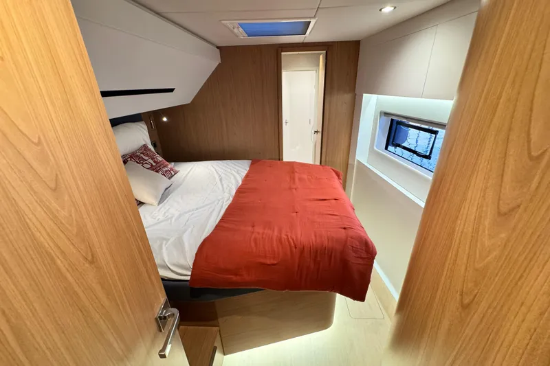  Yacht Photos Pics Luxurious cabin interior of 2026 Bali 5.2 yacht with cozy bed and modern design.