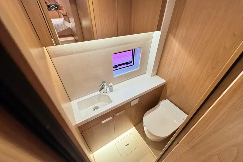  Yacht Photos Pics Modern bathroom in 2026 Bali 5.2 yacht with sleek design and compact layout.