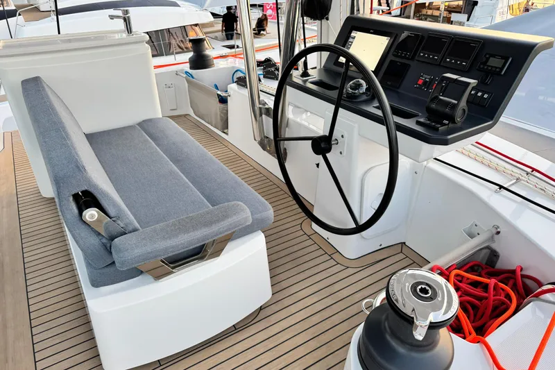  Yacht Photos Pics Modern Bali 5.2 yacht cockpit, 2026 model, featuring steering wheel and control panel.