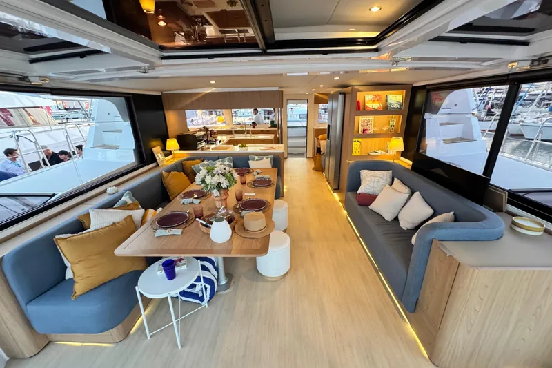  Yacht Photos Pics Luxurious interior of 2026 Bali 5.2 yacht with elegant dining and seating area.
