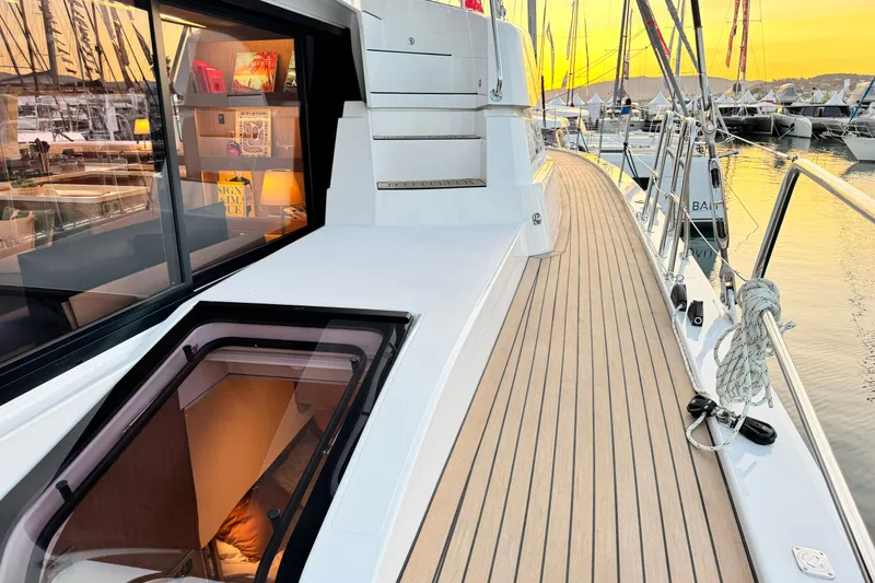  Yacht Photos Pics 2026 Bali 5.2 yacht deck at sunset, showcasing modern design and luxurious interior.