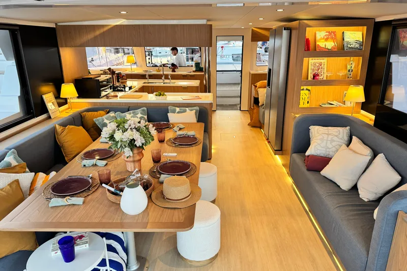  Yacht Photos Pics Luxurious interior of 2026 Bali 5.2 yacht with elegant dining and cozy seating.