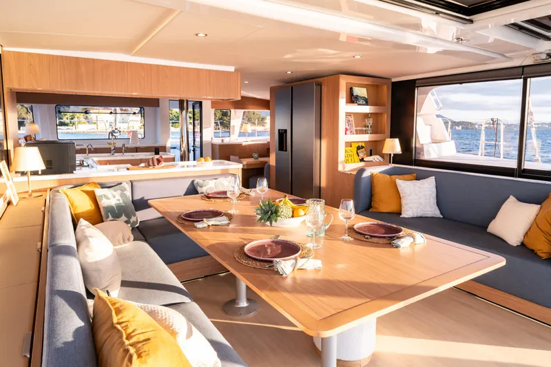  Yacht Photos Pics Luxurious interior of 2026 Bali 5.2 yacht with elegant dining area and scenic ocean view.
