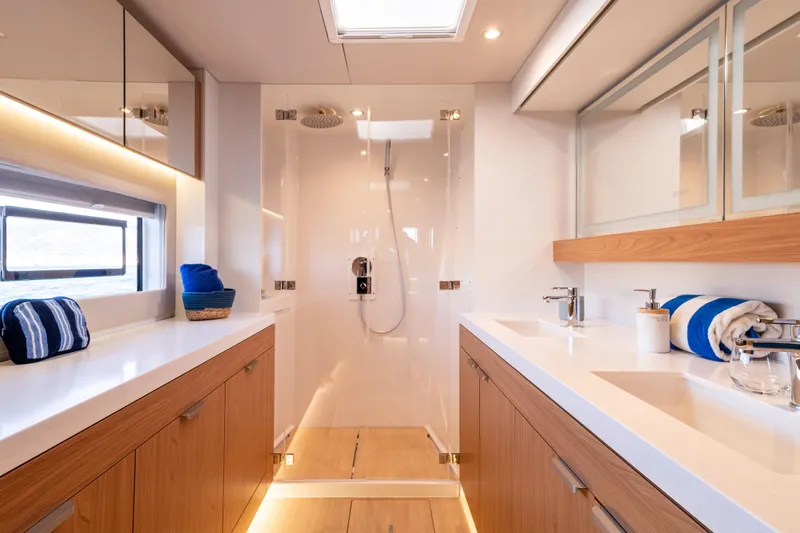 Yacht Photos Pics Luxurious bathroom in 2026 Bali 5.2 yacht with modern fixtures and elegant design.