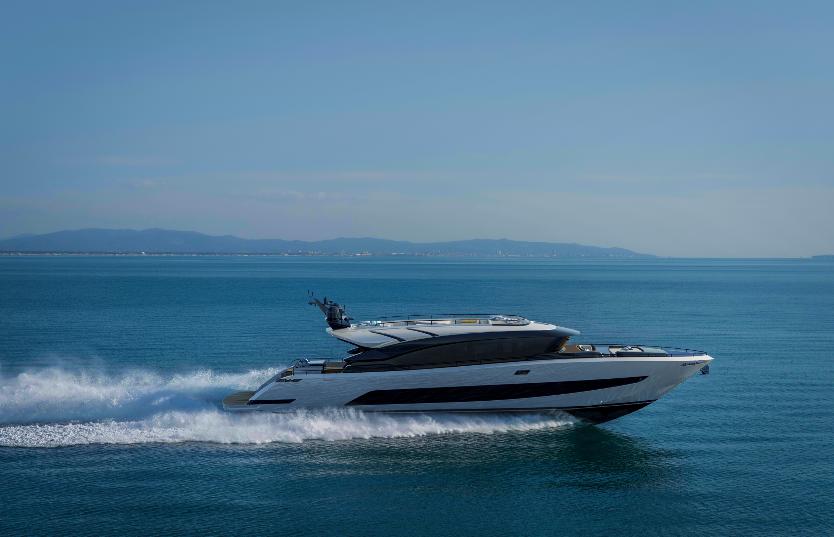 2025 AB 95 yacht cruising on open sea under clear blue sky.